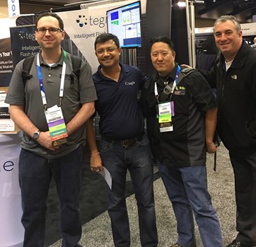 group-photo-in-front-of-tegile-booth-even-acosta